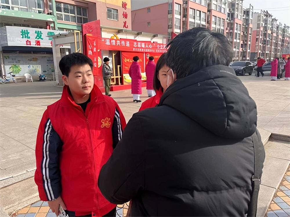 温暖共传递志愿暖人心秦皇岛市第十五中学开展学雷锋志愿服务活动