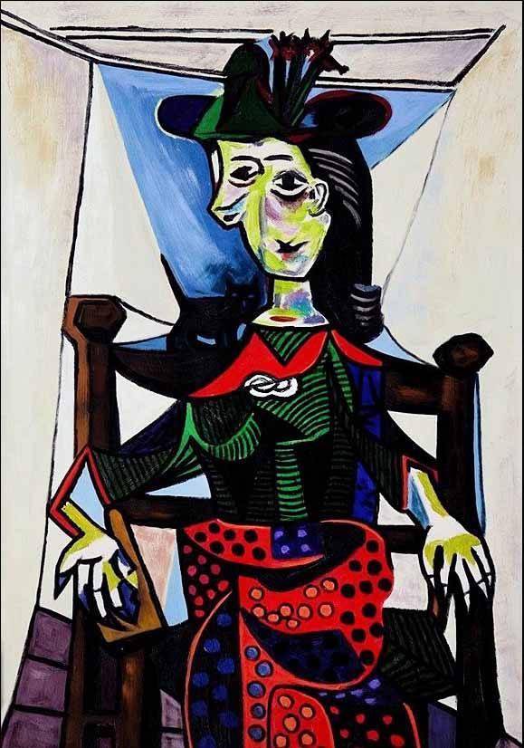 第四位:《多拉·马尔与猫》这是出自抽象派大家毕加索之手的名画,这幅