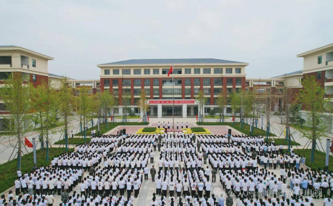 光山二高党委书记校长罗永新务实重干谋发展开拓创新谱华章