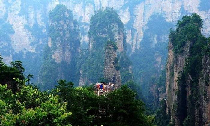 打算跟团去湖南张家界天门山凤凰古城旅游五天要多少钱看完少花60