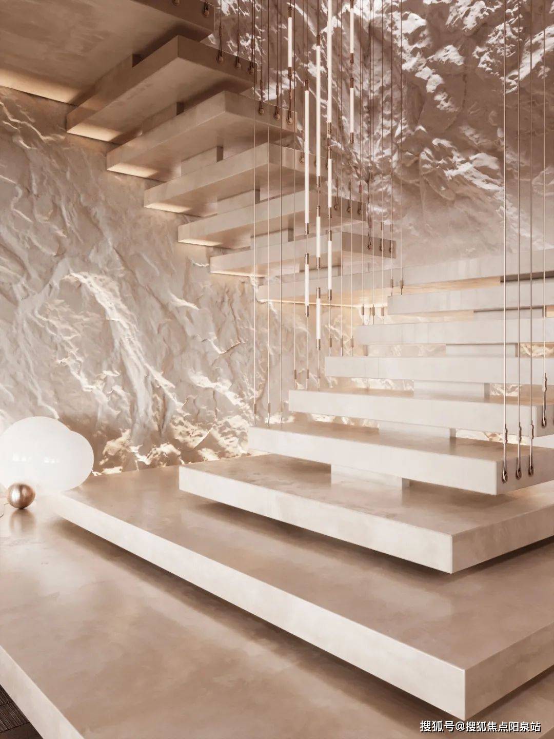 阶梯处更具艺术氛围,里面装饰墙凹凸不平,拾级而上,垂挂的金属吊灯有