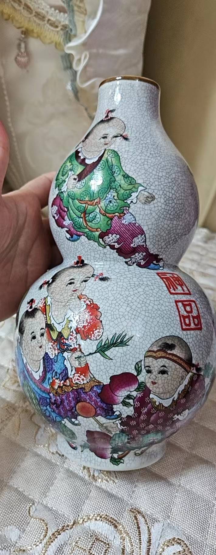 清乾隆款哥釉五彩婴戏纹葫芦瓶_搜狐网