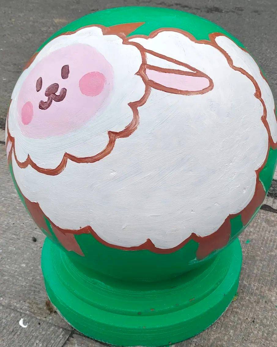 石墩彩绘十二生肖,点亮校园风景线