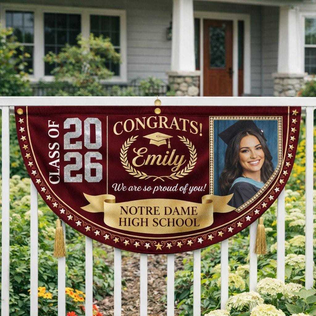 May include: A burgundy graduation banner with gold accents. The banner reads 