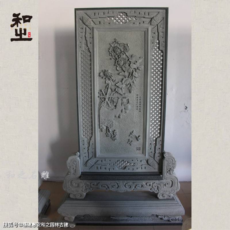 石雕浮雕雕刻在墙面上的一座浮雕壁画