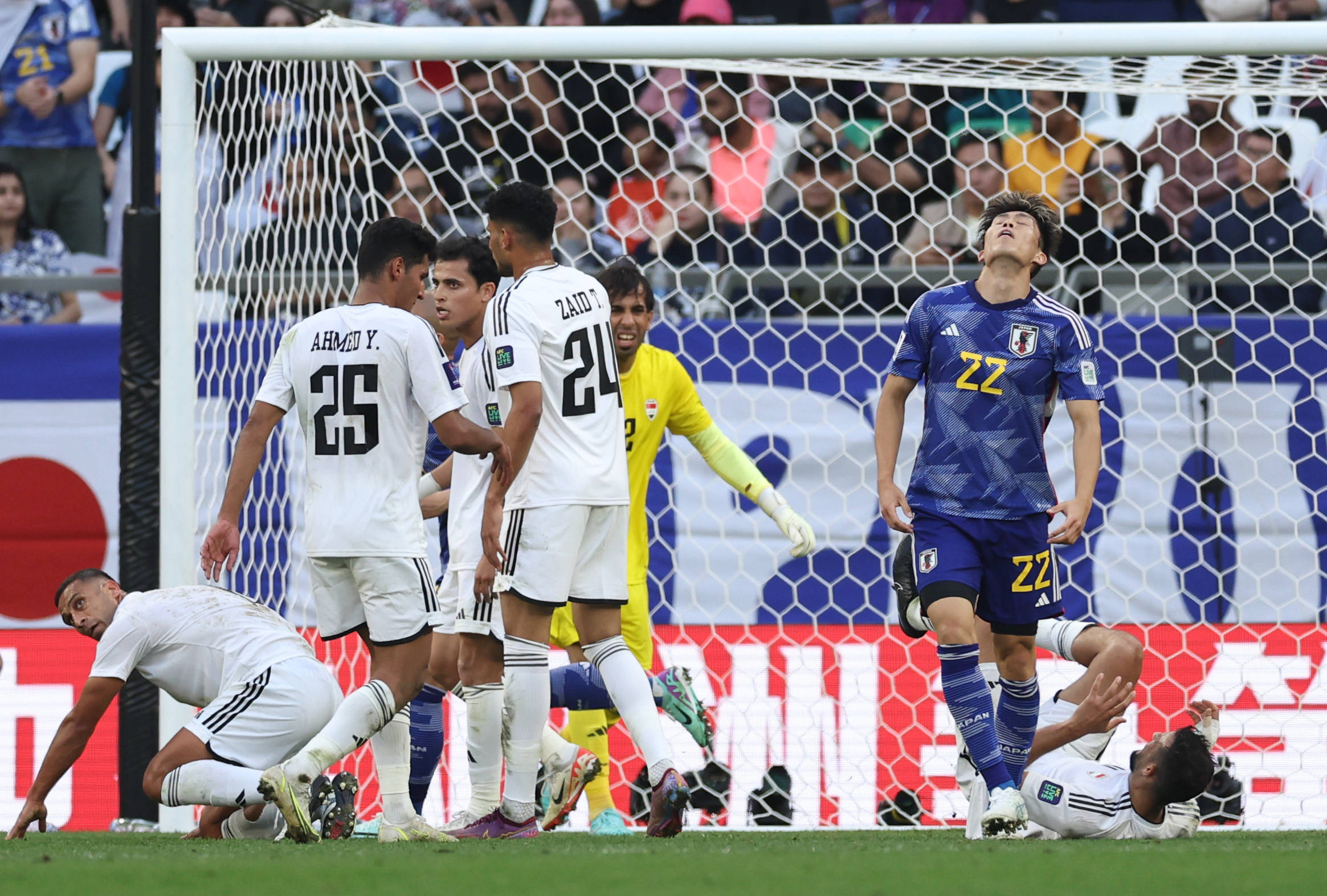 足球——小组赛d组:伊拉克队胜日本队