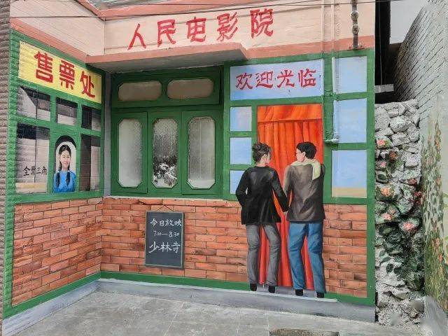 "墙绘的方式既美化了老街墙面,留存了城市记忆,又为周边居民和游客