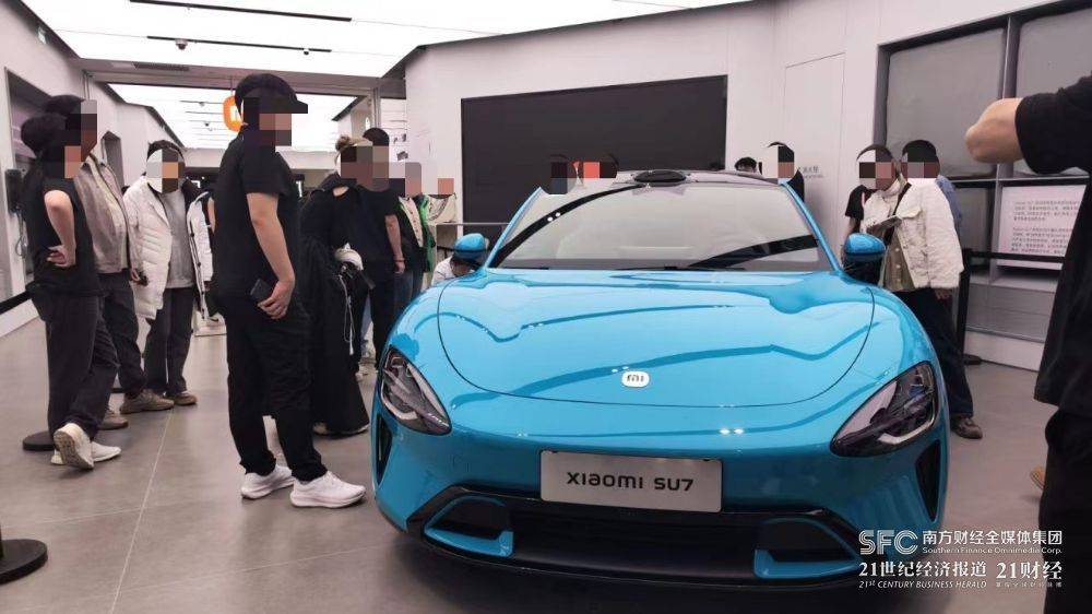 小米su7线上线下火爆,机构:定价处于市场预期区间_汽车_消费者_北京