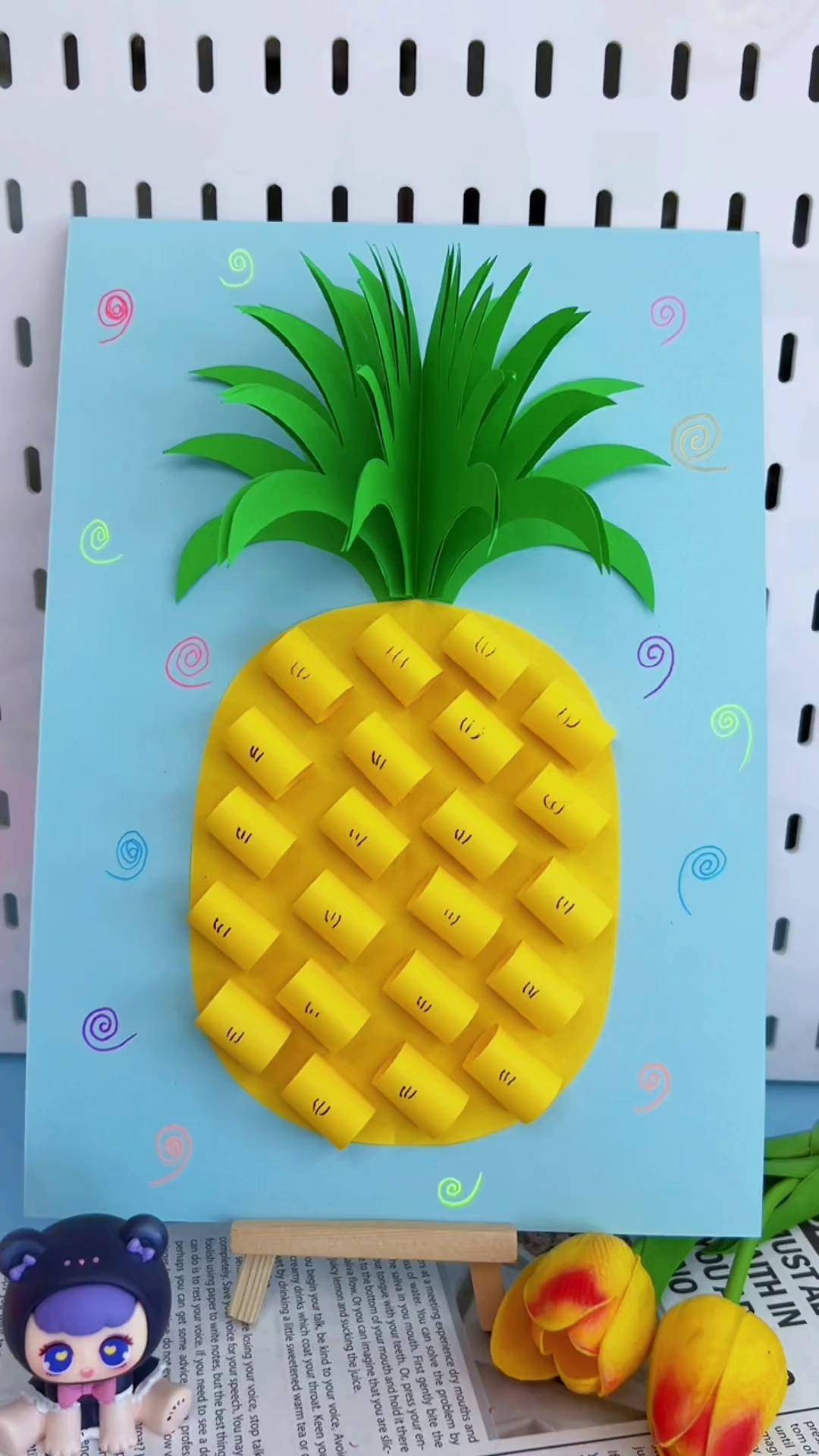 又到了吃菠萝的季节,用手工彩纸做好看的菠萝手工贴画吧!