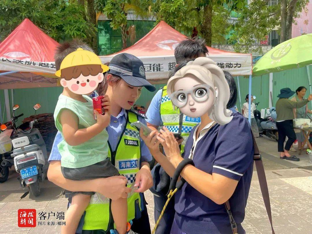 海南一名“交警姐姐”执勤时怀里还抱着个小男孩？很暖心